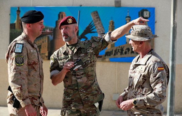 Officers of the US-led international coalition against ISIS stand outside the Joint Operations Centre in Baghdad's Green Zone on December 9. [Ahmad al-Rubaye/AFP]