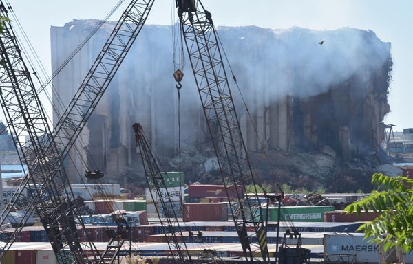 Smoke rises from what remains of the silos at Beirut port after a fire broke out on July 8. [Ziad Hatem/Al-Mashareq]