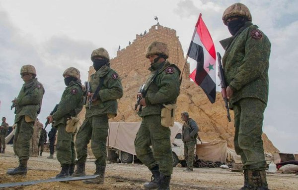 Mercenaries recruited by a Russian-controlled private security company are seen here in the Syrian desert in a recruitment advertisement shared on social media.