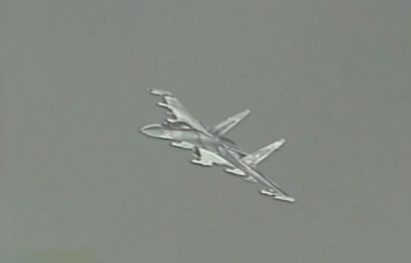 A screenshot from a CENTCOM video from April 18 shows a Russian fighter that came within 2,000 feet of a US aircraft.